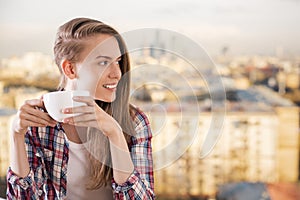 Pretty woman drinking coffee