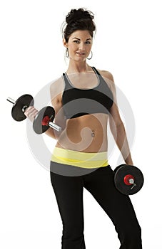 Pretty Woman with Dumbbells on White Background