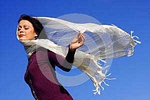 Pretty woman enjoying the wind