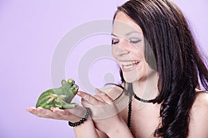 Pretty woman with frog