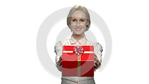 Pretty woman giving gift box on white background.