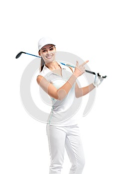 Pretty woman golfer on white background in studio