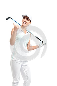 Pretty woman golfer on white background in studio