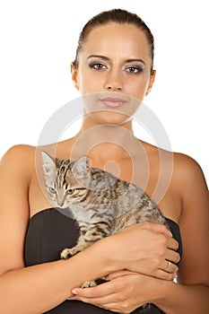 Pretty woman hold her lovely cat isolated on a white