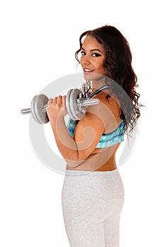 Pretty woman lifting dumbbell's.