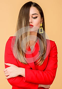 Pretty woman makeup face red lips. Woman wear glamorous earrings. Hairstyle and hairdresser. Ombre hair coloring effect
