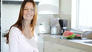 Pretty woman making a sandwich