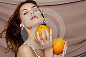 pretty woman with oranges fruit beauty fashion studio
