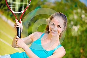 Pretty woman playing tennis