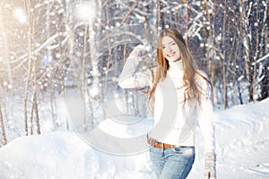 Pretty woman portrait outdoor in winter. Young woman at winter. Winter young woman portrait. Beautiful young woman laughing outdoo