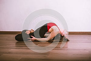 Pretty woman practicing yoga