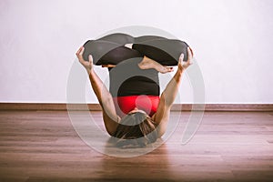 Pretty woman practicing yoga