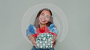 Pretty woman presenting birthday gift box, offer wrapped present career bonus, celebrating party