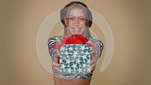 Pretty woman presenting birthday gift box, offer wrapped present career bonus, celebrating party