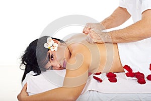 Pretty woman receive deep back massage