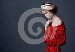Pretty woman red dress luxury decoration ethnicity gray background