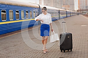 Pretty woman at the train station