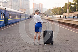 Pretty woman at the train station photo