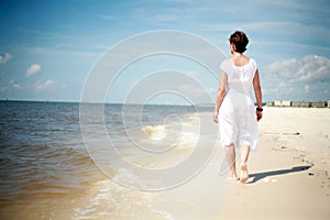 Pretty Woman Walking the Beach