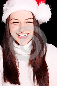 Pretty woman wearing santa hat