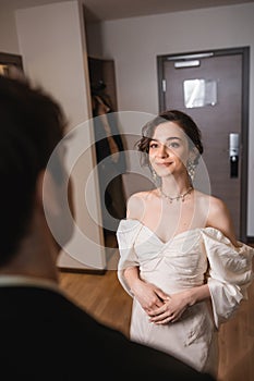 pretty young bride in elegant jewelry