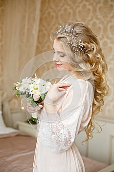 Pretty young Bride`s wedding morning photo