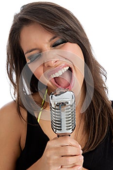 Pretty young female with retro microphone isolated