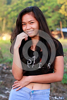 Pretty young Filipino environmental portraiture photo