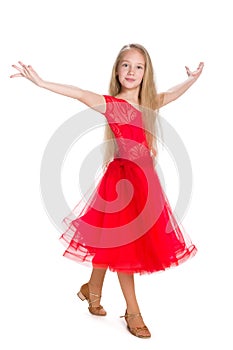 Pretty young girl dances photo