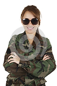 Pretty young girl dressed in green military