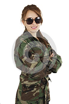 Pretty young girl dressed in green military