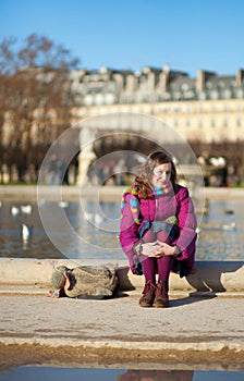 Pretty young girl in the Tuilleries garden in photo