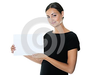 Pretty young lady holding a blank billboard