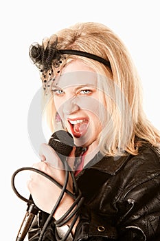 Pretty young singer or comedian with microphone