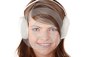 Pretty young teen girl wearing white earmuff