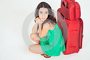 Pretty young woman with big luggage waiting your flight plane