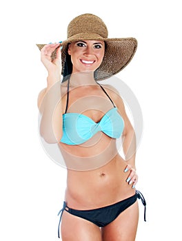 Pretty young woman in bikini and straw hat.