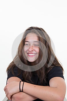 Pretty young woman in black shirt brunette girl in good mood happy beauty concept isolated on white background