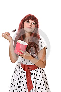 Pretty young woman eating ice cream