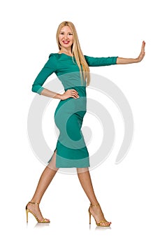 Pretty young woman in green dress isolated on