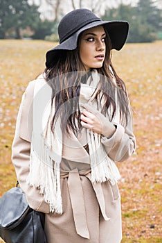 Pretty young woman with hat