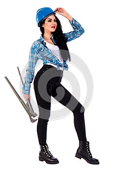 Pretty young woman with a heavy-duty straight pipe wrench