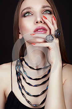 Pretty young woman with jewelry rings