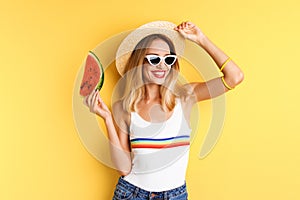 Pretty young woman with juicy watermelon