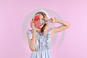 Pretty young woman with juicy watermelon