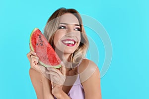 Pretty young woman with juicy watermelon