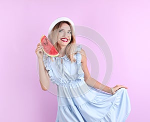 Pretty young woman with juicy watermelon