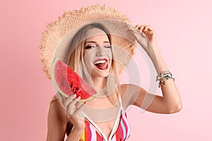 Pretty young woman with juicy watermelon