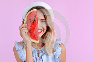 Pretty young woman with juicy watermelon