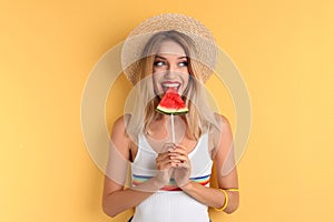 Pretty young woman with juicy watermelon